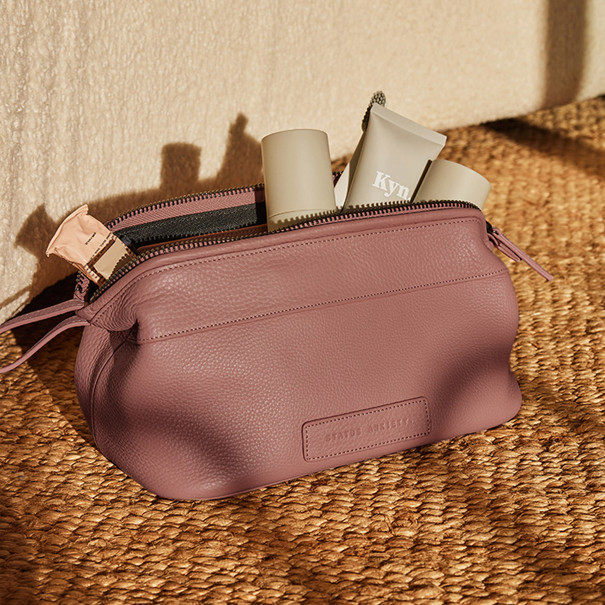 STATUS ANXIETY Liability Toiletries Bag dusty rose