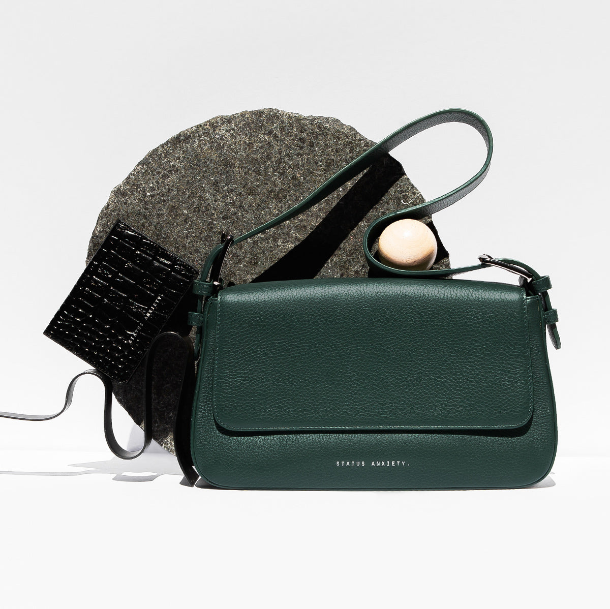 STATUS ANXIETY Figure You Out green