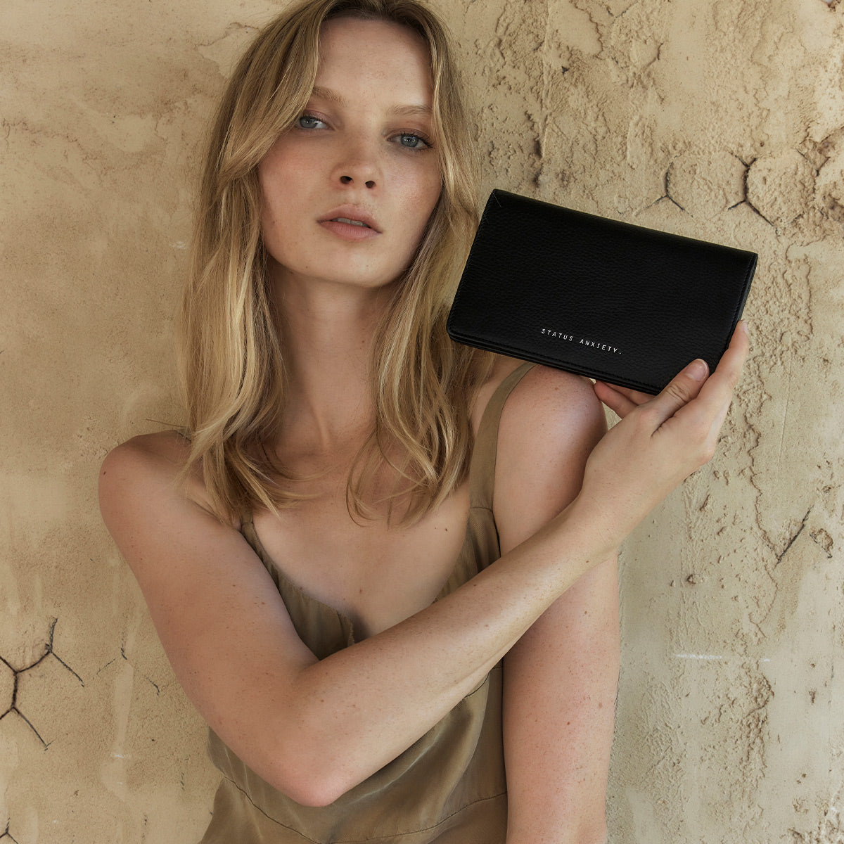 STATUS ANXIETY Living Proof black
