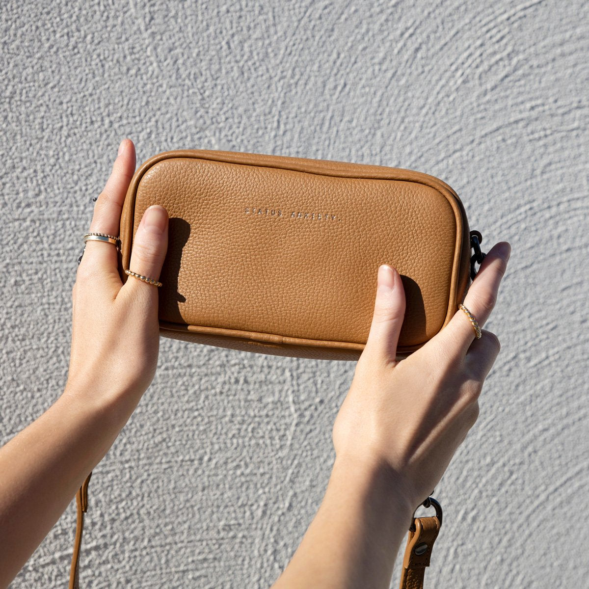 STATUS ANXIETY New Normal tan